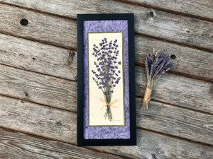Real pressed Lavender flowers arranged in a bouquet set on handmade paper in a solid wood black lacquered frame. Made in Canada by Pressed Wishes.