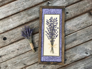 Real pressed Lavender flowers arranged in a bouquet set on handmade paper in a solid wood walnut stained frame. Made in Canada by Pressed Wishes.