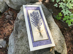 Real pressed Lavender flowers arranged in a bouquet set on handmade paper in a solid wood white linen stained frame. Made in Canada by Pressed Wishes
