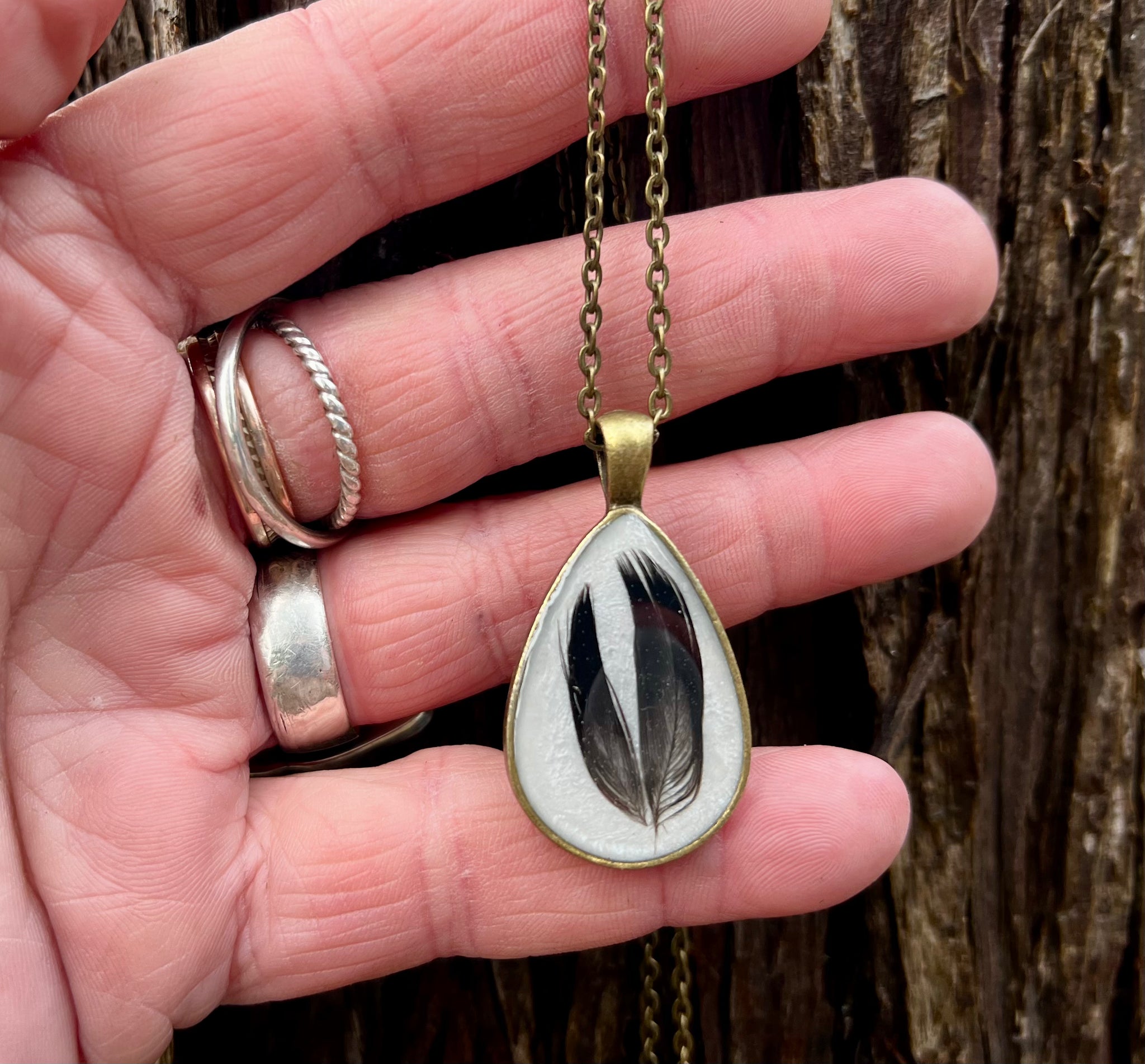 Raven feather necklace deals