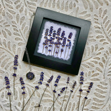 pressed lavender framed picture and stainless steel locket. 