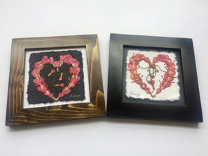 pressed bleeding heart in heart shape; perfect for valentines day. black and brown frame