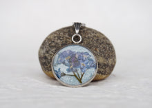 pressed forget me not flower pendant necklace with blue background