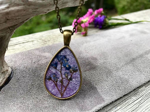 Pressed Forget Me Not Flowers on Sparkly Purple Handmade Paper by Pressed Wishes - Resin Jewellery Handmade in Canada